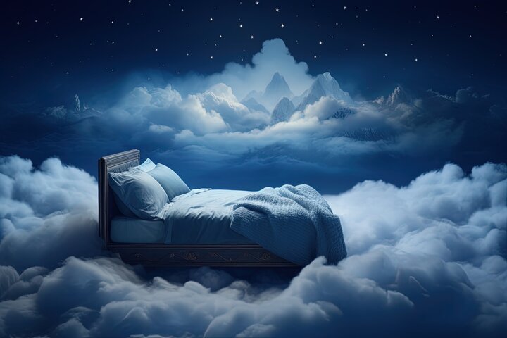 Bed in the clouds at night