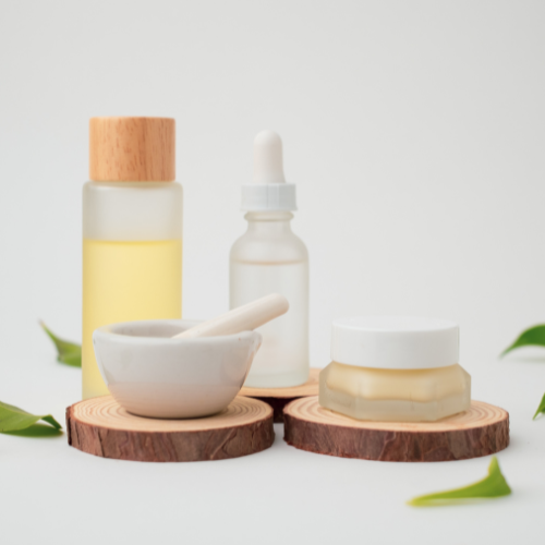 Skin care with pastel and mortar on wooden podium with natural leaf on the way background